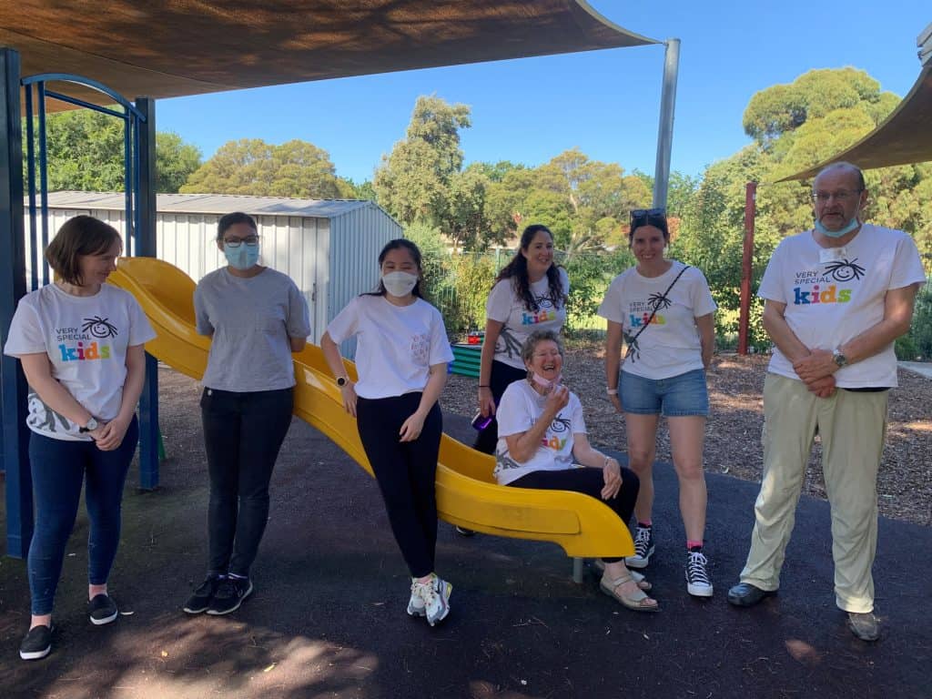 Volunteers helping at Yarraville Family Day smile for the camera